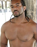Huge Black Stud Relaxes Naked Outside